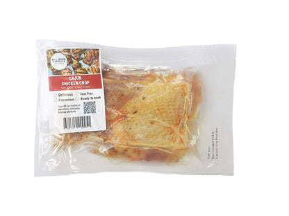 Packaged Cajun Chicken Dip with label on a white background