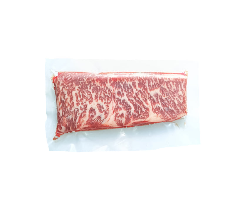 Raw marbled beef on a white background