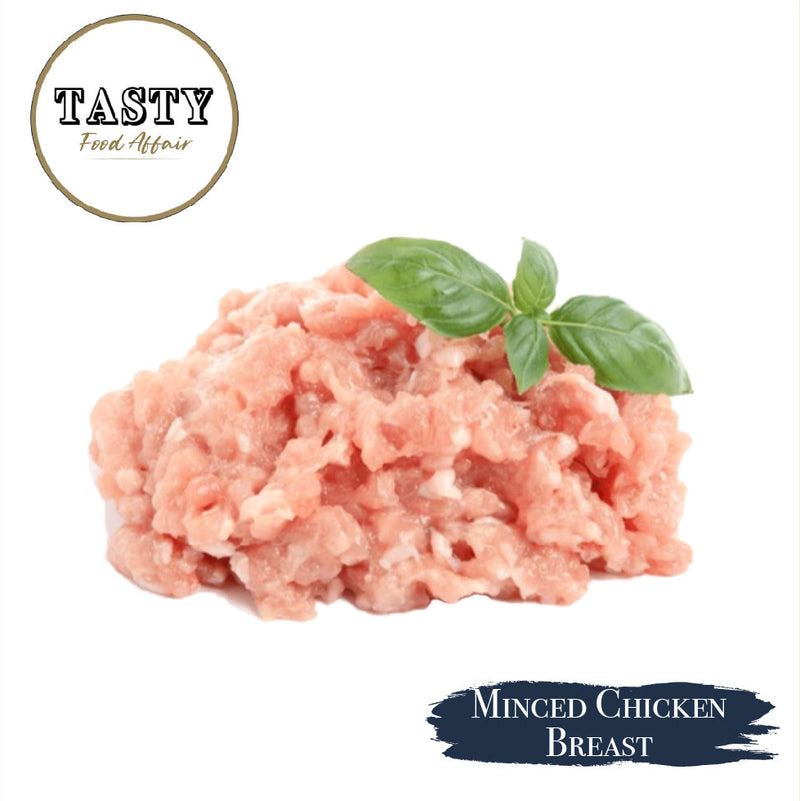 Minced chicken breast with basil leaves on a white background, branded as Tasty Food Affairs.