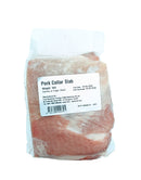 Packaged pork collar slab with a label on a white background