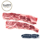 Two pieces of marbled raw beef with 'Tasty Food Affair' branding on a white background.