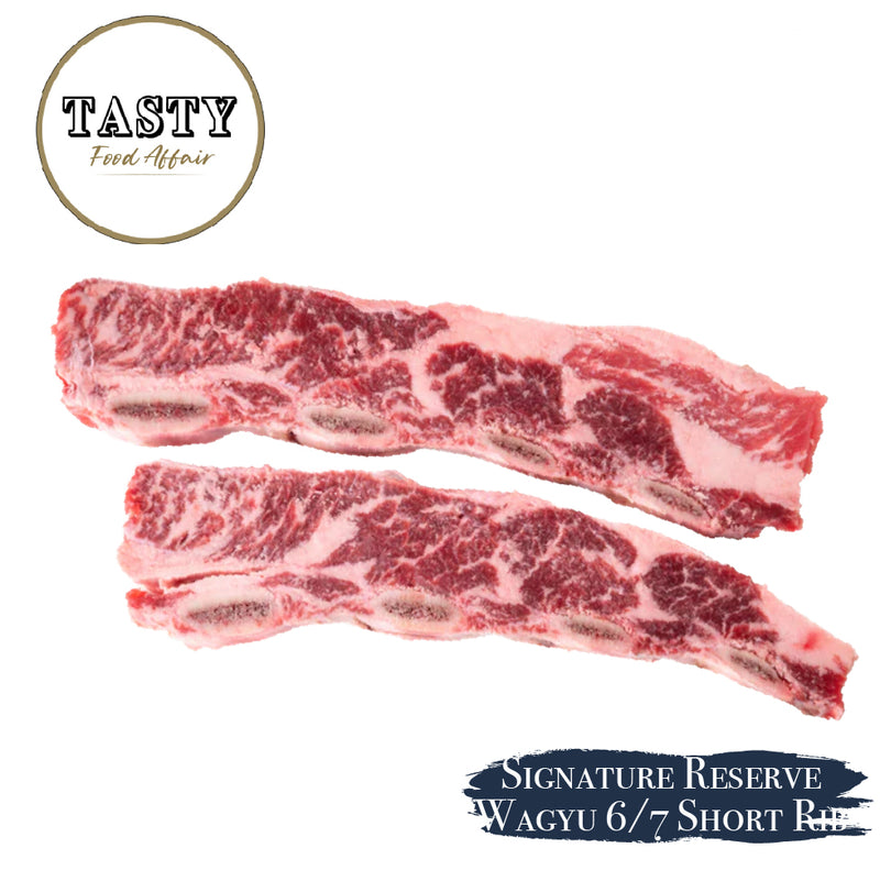 Two pieces of marbled raw beef with 'Tasty Food Affair' branding on a white background.