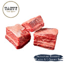 Three pieces of marbled beef with 'Tasty Food Affair' logo and 'Signature Reserve Wagyu 6/7 Short Ribs' text.