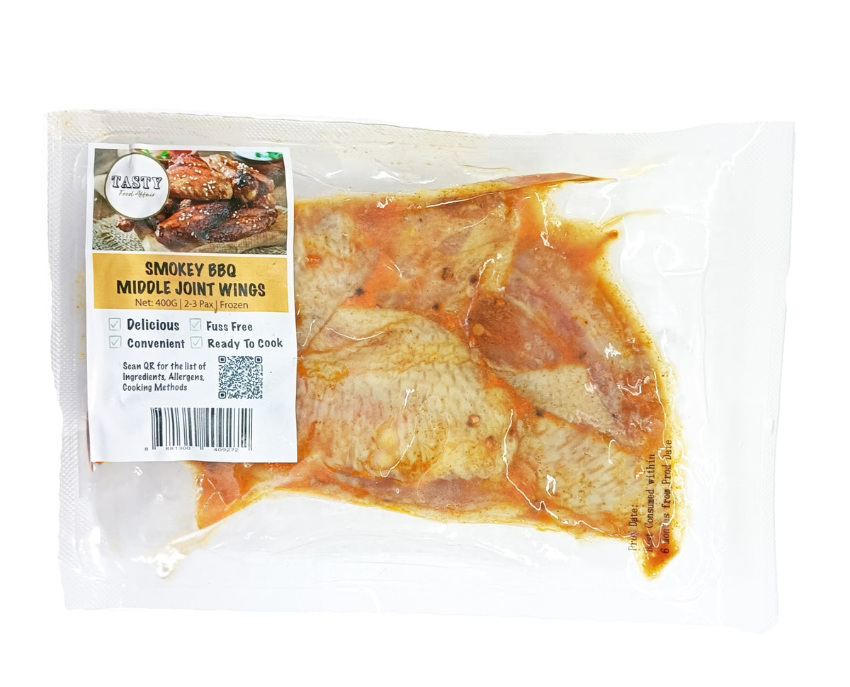 Packaged BBQ chicken wings with a label on a white background