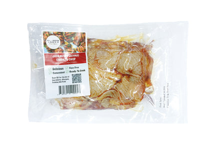 Packaged chicken chop with a label on a white background