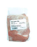 Packaged pork collar slab with a label on a white background